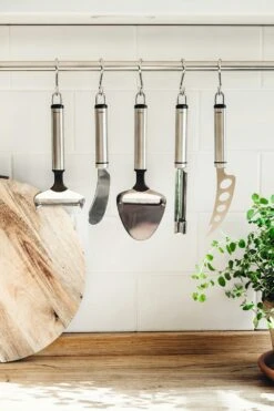 Voorkant -Default Template 4 heirol steely klokhuisverwijderaar 0